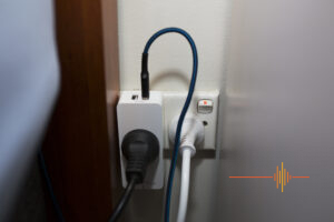 Connect SmartHome Wi-Fi Plug with Dual USB and Power Monitoring plugged in with cords